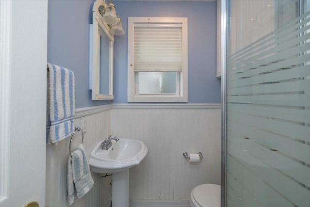 25 Cottage Rd, Baiting Hollow, NY 11933 - bathroom with toilet, a wainscoted wall, and a shower