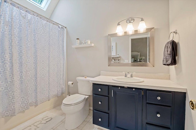 57 Harbor Park Dr, Centerport, NY 11721 - bathroom with a skylight, vanity, tile patterned flooring, toilet, and shower / bathtub combination with curtain