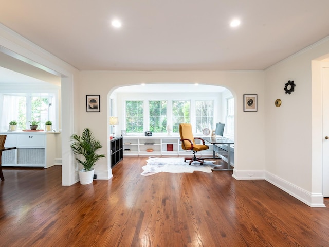 62 Webster Ave, Manhasset, NY 11030 - office area featuring arched walkways, wood finished floors, healthy amount of natural light, crown molding, and recessed lighting