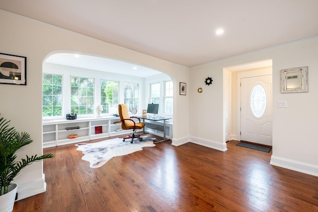 62 Webster Ave, Manhasset, NY 11030 - foyer entrance featuring arched walkways, plenty of natural light, wood finished floors, ornamental molding, and recessed lighting