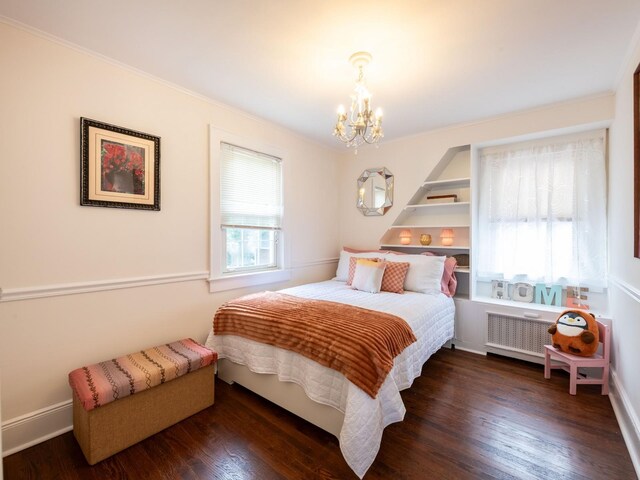 62 Webster Ave, Manhasset, NY 11030 - bedroom featuring a chandelier, wood finished floors, and radiator heating unit