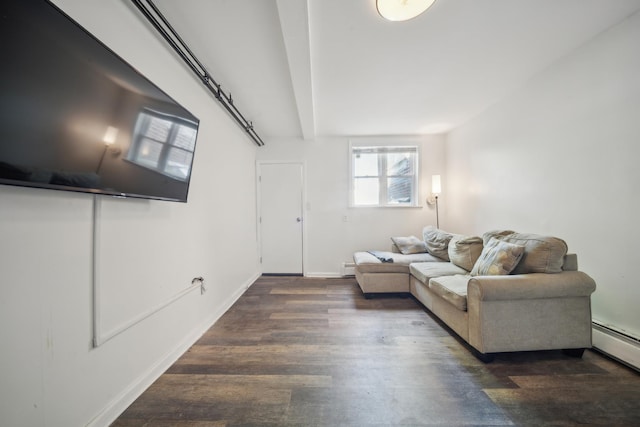 1304 Waring Ave, Bronx, NY 10469 - living area featuring a baseboard heating unit, dark wood-style flooring, and baseboards