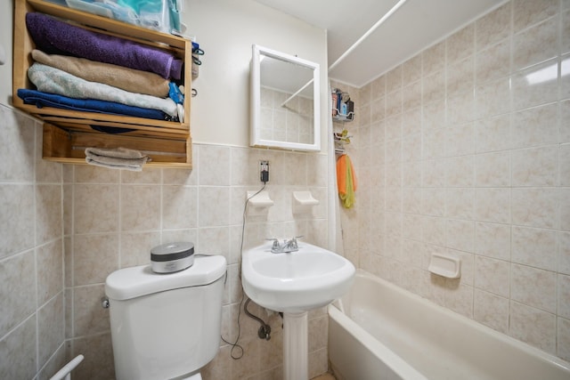 1304 Waring Ave, Bronx, NY 10469 - full bath featuring toilet, tile walls, and washtub / shower combination