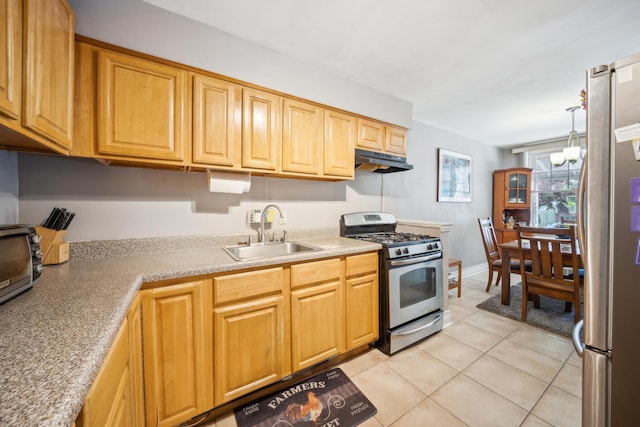 1304 Waring Ave, Bronx, NY 10469 - kitchen featuring stainless steel appliances, a sink, under cabinet range hood, light tile patterned floors, and light countertops