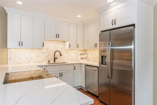 32 Lower Cross, Shoreham, NY 11786 - kitchen with stainless steel appliances, a sink, light stone countertops, white cabinetry, and recessed lighting