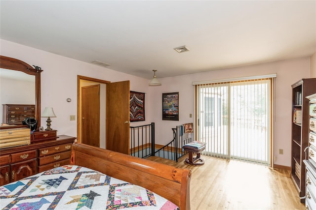 32 Lower Cross, Shoreham, NY 11786 - bedroom with access to outside, light wood finished floors, and baseboards