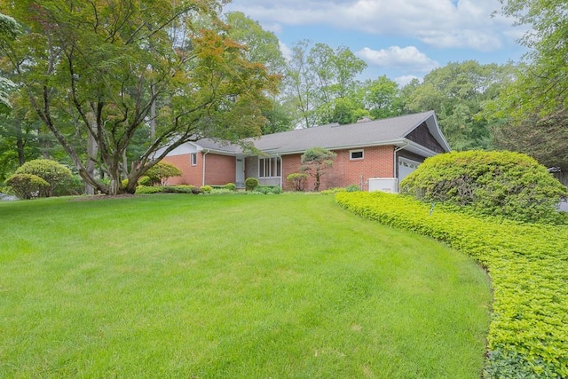 211 N Little Tor Rd, New City, NY 10956 - view of green lawn featuring a garage