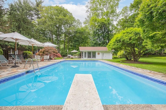 211 N Little Tor Rd, New City, NY 10956 - outdoor pool with a patio, a storage structure, an outdoor structure, a diving board, and a lawn