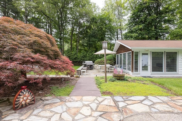 211 N Little Tor Rd, New City, NY 10956 - view of yard featuring a patio, outdoor dining space, and a sunroom