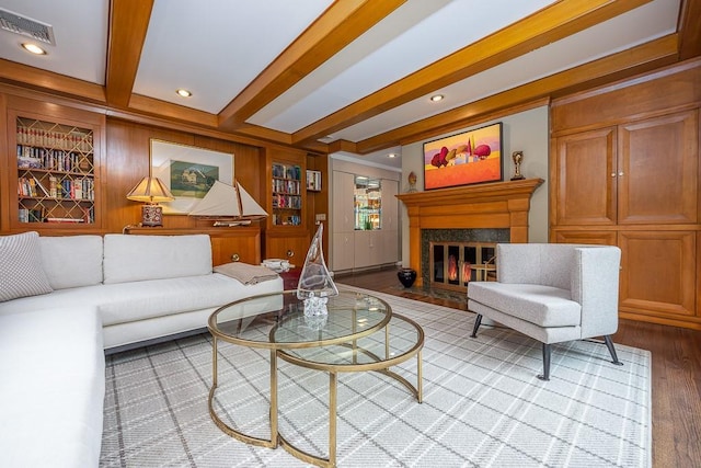 211 N Little Tor Rd, New City, NY 10956 - living room with wood finished floors, beamed ceiling, and a premium fireplace