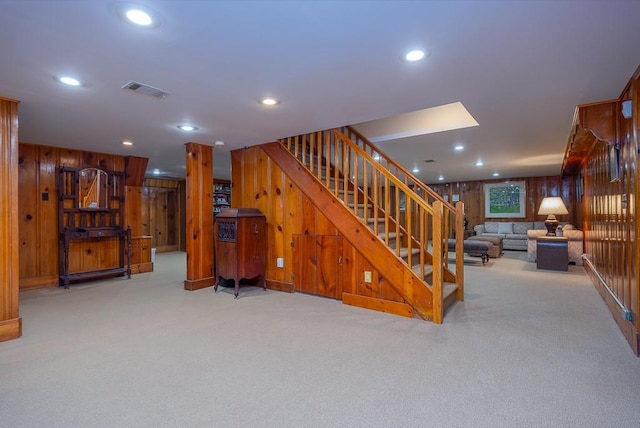 211 N Little Tor Rd, New City, NY 10956 - basement featuring carpet flooring, wood walls, stairs, and recessed lighting