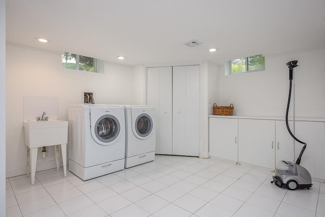 211 N Little Tor Rd, New City, NY 10956 - laundry room with washer and dryer, recessed lighting, and light tile patterned floors