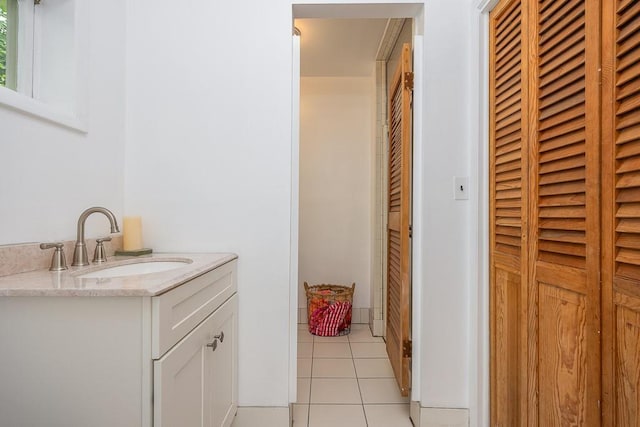 211 N Little Tor Rd, New City, NY 10956 - bathroom with tile patterned flooring, vanity, a heating unit, and a closet