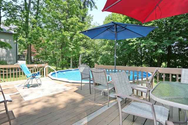 173 Massachusetts Ave, Congers, NY 10920 - wooden deck with outdoor dining area and an outdoor pool