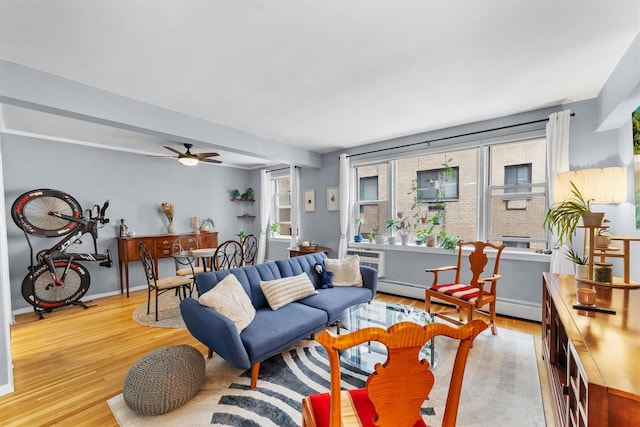 120 E Hartsdale Unit 3L, Hartsdale, NY 10530 - living room featuring wood finished floors, a ceiling fan, and baseboards