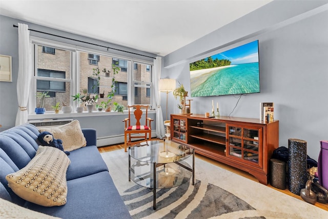 120 E Hartsdale Unit 3L, Hartsdale, NY 10530 - living room with wood finished floors and a baseboard radiator