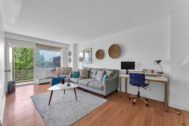 5700 Arlington Ave Unit 5D, Bronx, NY 10471 - living room featuring an office area, light wood finished floors, and baseboard heating
