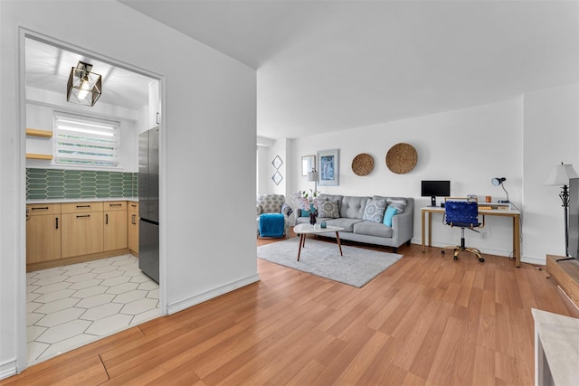 5700 Arlington Ave Unit 5D, Bronx, NY 10471 - living area with light wood-type flooring and a desk