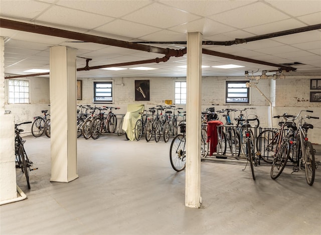 basement featuring a drop ceiling