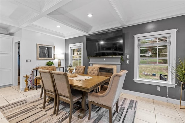 2 Fieldstone Ct, Highland, NY 12528 - dining space with light tile patterned floors, beam ceiling, baseboards, ornamental molding, and a fireplace