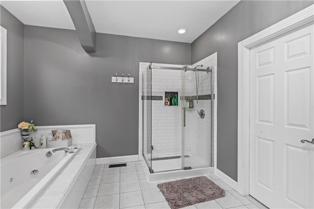 2 Fieldstone Ct, Highland, NY 12528 - bathroom featuring a jetted tub, a shower stall, tile patterned floors, and baseboards