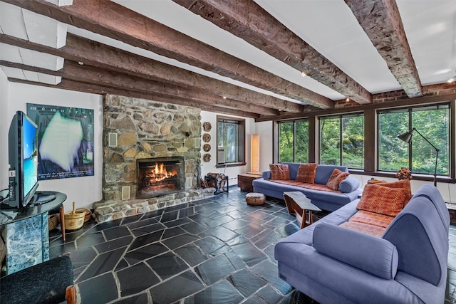 1670 Baptist Church Rd, Yorktown Heights, NY 10598 - living area with beam ceiling, stone flooring, a stone fireplace, and healthy amount of natural light