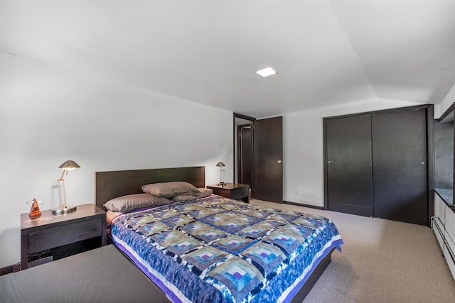 1670 Baptist Church Rd, Yorktown Heights, NY 10598 - bedroom featuring lofted ceiling, baseboard heating, a closet, and carpet