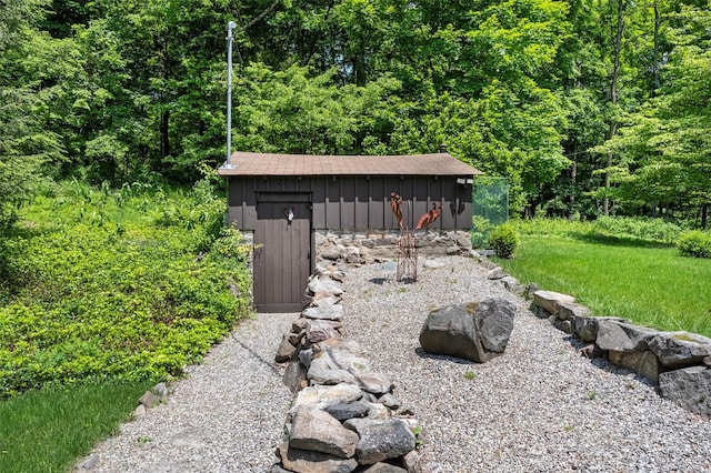 1670 Baptist Church Rd, Yorktown Heights, NY 10598 - view of shed featuring a wooded view