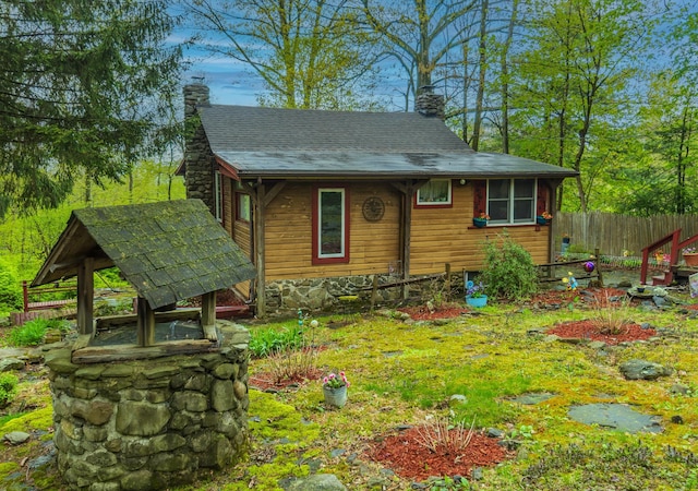 16 Arbor Trl, Monroe, NY 10950 - back of house with a chimney and roof with shingles