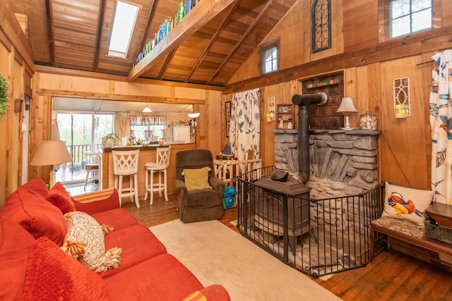 16 Arbor Trl, Monroe, NY 10950 - living room with wooden walls, wood ceiling with exposed beams, plenty of natural light, wood finished floors, and high vaulted ceiling