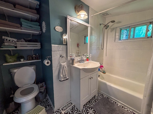 16 Arbor Trl, Monroe, NY 10950 - full bathroom featuring vanity, bathing tub / shower combination, toilet, and tile patterned flooring
