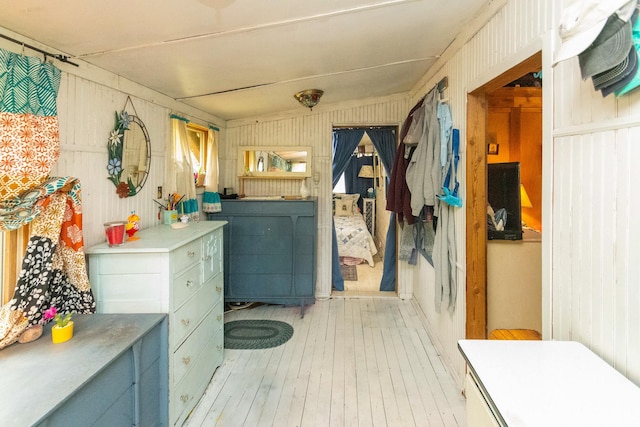 16 Arbor Trl, Monroe, NY 10950 - miscellaneous room featuring light wood-style floors and wooden walls