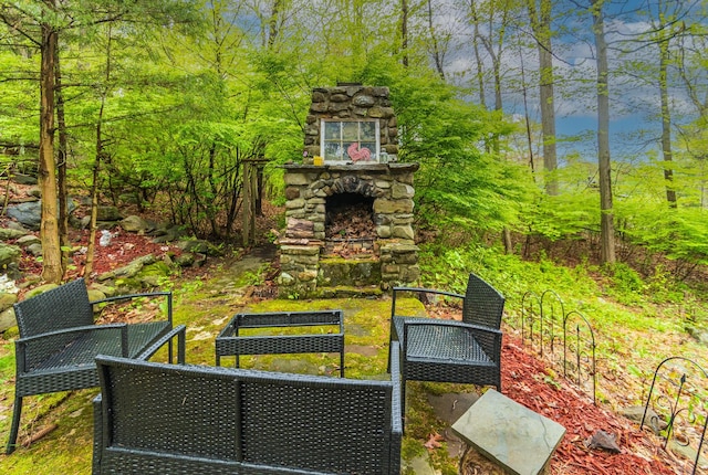 16 Arbor Trl, Monroe, NY 10950 - view of yard featuring an outdoor stone fireplace and a patio area
