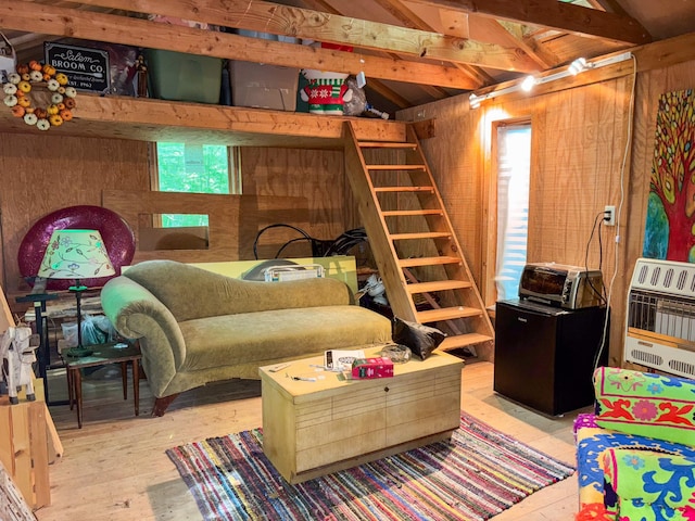 16 Arbor Trl, Monroe, NY 10950 - bedroom featuring wood walls, heating unit, and hardwood / wood-style floors