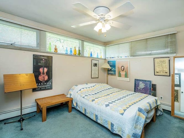 31 Townsend St, Glen Head, NY 11545 - carpeted bedroom featuring a baseboard radiator, baseboard heating, and ceiling fan