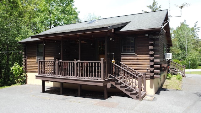 29 Fallen Tree Ln, Athens, NY 12051 - view of front of home with log exterior, stairway, and roof with shingles