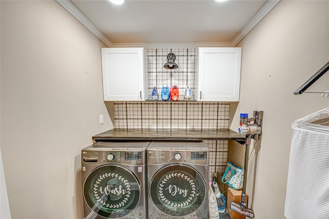 1 Idle Day Dr, Centerport, NY 11721 - laundry area featuring cabinet space, washer and clothes dryer, and crown molding