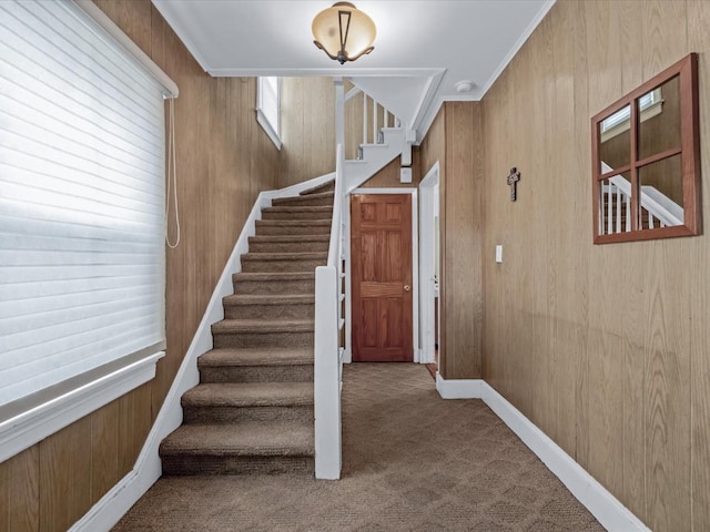 1311 154th St, Beechhurst, NY 11357 - stairway featuring carpet, wood walls, and baseboards