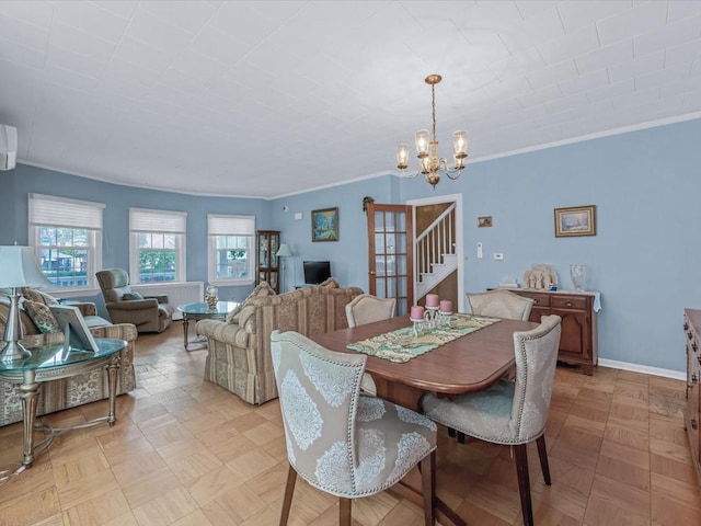 1311 154th St, Beechhurst, NY 11357 - dining area featuring a chandelier, crown molding, stairway, and baseboards