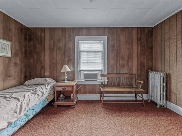 1311 154th St, Beechhurst, NY 11357 - bedroom featuring radiator heating unit, cooling unit, carpet, and wooden walls