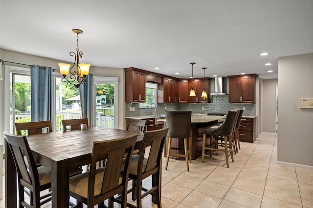 2 Old Brookville Ct, Manorville, NY 11949 - dining area with light tile patterned floors, a chandelier, and recessed lighting
