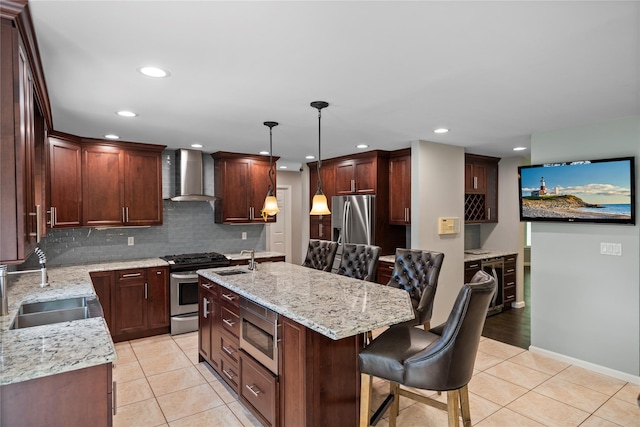 2 Old Brookville Ct, Manorville, NY 11949 - kitchen featuring wall chimney range hood, stainless steel appliances, light tile patterned flooring, a breakfast bar area, and recessed lighting