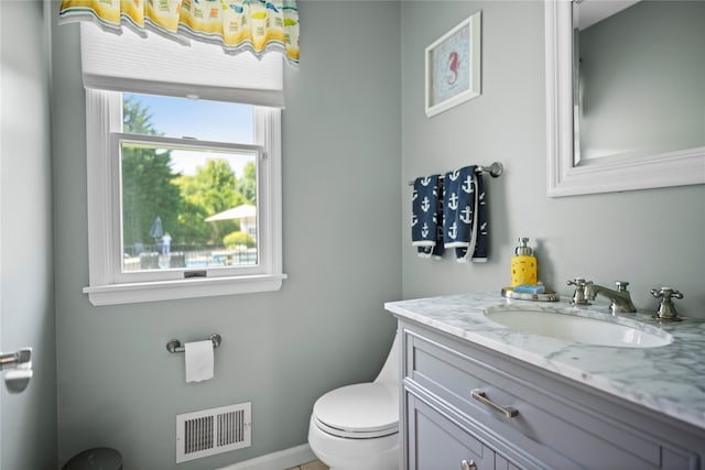 2 Old Brookville Ct, Manorville, NY 11949 - half bathroom featuring toilet and vanity