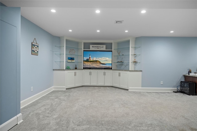 2 Old Brookville Ct, Manorville, NY 11949 - indoor bar featuring light colored carpet, a wood stove, and recessed lighting