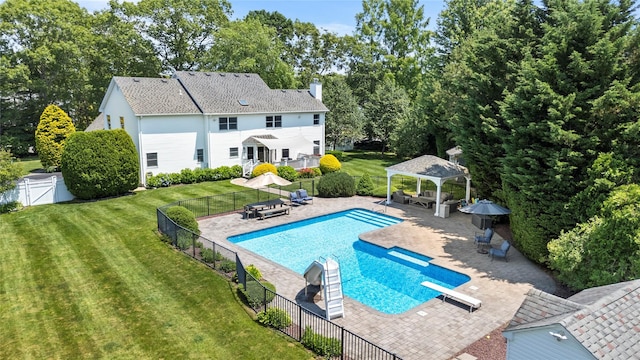 2 Old Brookville Ct, Manorville, NY 11949 - view of swimming pool featuring a gazebo, a fenced backyard, a diving board, a patio, and view of scattered trees