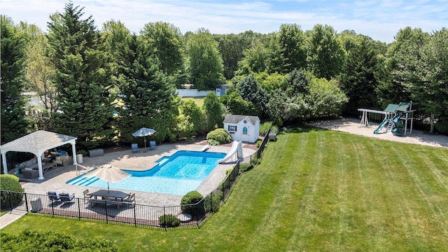 2 Old Brookville Ct, Manorville, NY 11949 - view of pool with a gazebo, a patio, a playground, and a storage unit