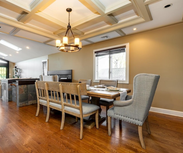 135 Ocean Ave, Massapequa, NY 11758 - dining space with a chandelier, coffered ceiling, wood finished floors, beamed ceiling, and baseboards