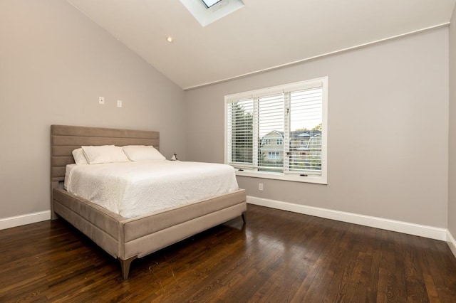 135 Ocean Ave, Massapequa, NY 11758 - bedroom with baseboards, hardwood / wood-style floors, a skylight, and vaulted ceiling