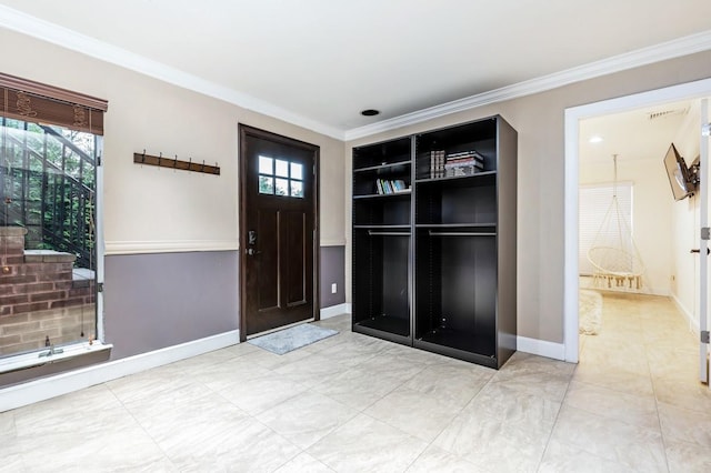 135 Ocean Ave, Massapequa, NY 11758 - entryway with healthy amount of natural light, ornamental molding, and baseboards