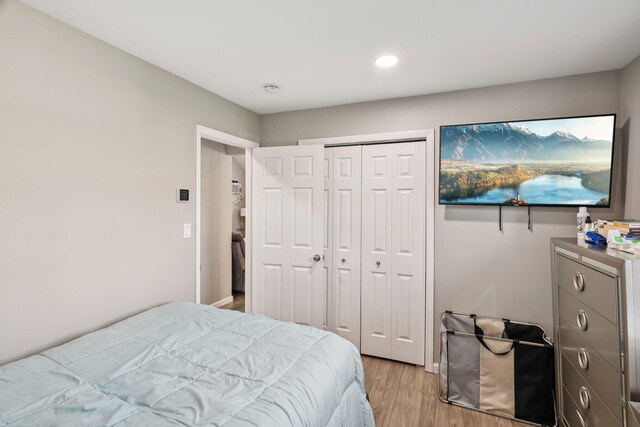 70 Propose Rd, Shirley, NY 11967 - bedroom featuring light wood-style flooring, a closet, and recessed lighting